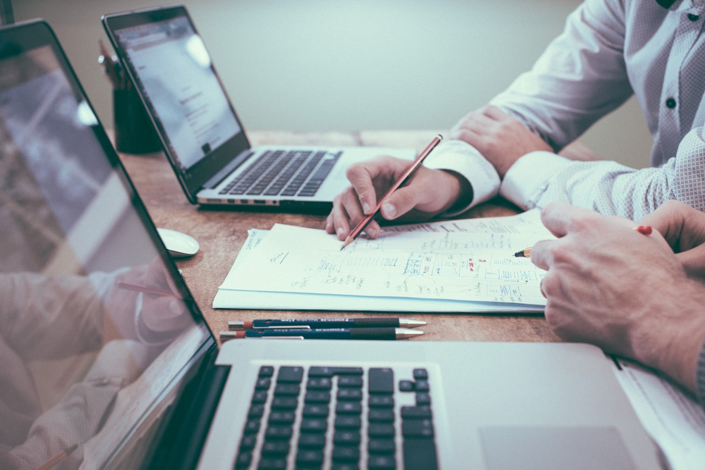 A marketing team reviewing engagement data and campaign analytics together. Reading the numbers properly is the difference between a strong campaign and a wasted budget.